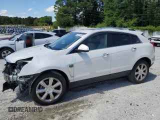 2013 Cadillac SRX Performance Collection с VIN 3GYFNDE33DS534401, выставлен на аукционе Copart как лот 56501635 с пробегом 292 027 миль миль и Списание • Salvage title. История ставок и продаж доступна на DreamBid. Изображение 1.
