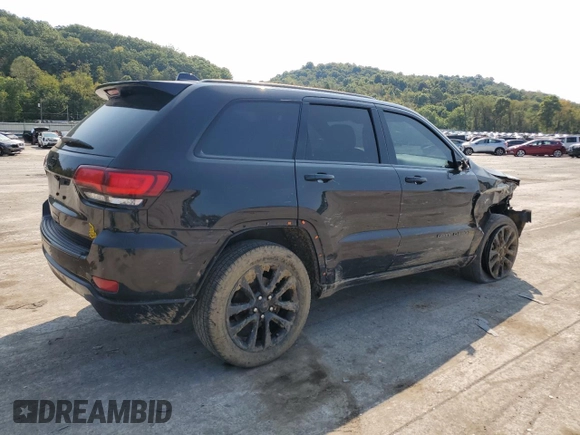2018 Jeep Grand Cherokee Laredo E with VIN 1C4RJFAG9JC390597, listed as a Copart auction lot 71450474 with 69,645 mi miles and Salvage title. Bid and sale history available at DreamBid. Image 3.