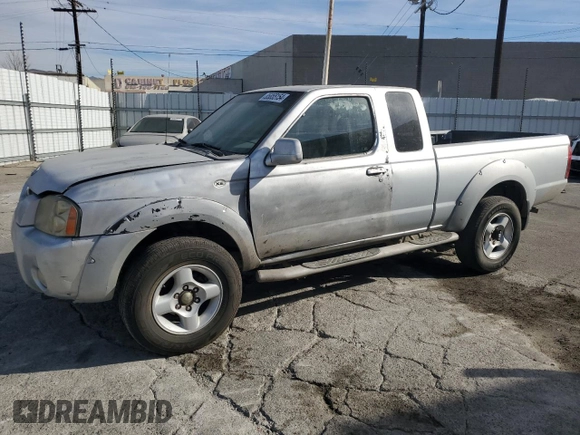 2001 Nissan Frontier SE Desert Runner with VIN 1N6ED26T11C345641, listed as a Copart auction lot 85855154 with 227,928 mi miles and Salvage title. Bid and sale history available at DreamBid. Image 1.