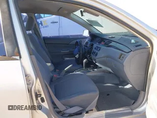 2002 Mitsubishi Lancer LS with VIN JA3AJ36E22U035784, listed as a IAAI auction lot 40628995 with 1 mi miles. Bid and sale history available at carsss.com. Image 5.