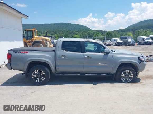 2019 Toyota Tacoma SR with VIN 3TMCZ5AN1KM274625, listed as a IAAI auction lot 42660593 with 163,460 mi miles and . Bid and sale history available at DreamBid. Image 13.