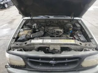 2000 Ford Explorer z VIN 1FMDU65P9YUB42443, wystawiony jako Copart lot #70036074 z przebiegiem 175 479 mil mil oraz Szkoda całkowita • Salvage title. Historia ofert i sprzedaży dostępna na DreamBid. Obrazek 11.