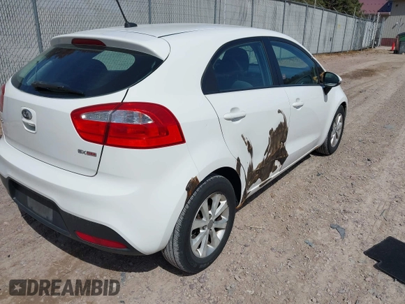 2012 Kia Rio EX with VIN KNADN5A37C6031494, listed as a IAAI auction lot 42052186 with 141,765 mi miles. Bid and sale history available at carsss.com. Image 4.