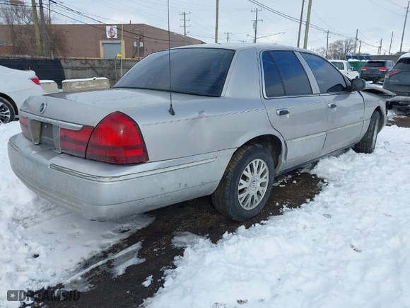 2005 Mercury Grand Marquis LS Premium with VIN 2MHFM75W55X617828, listed as a IAAI auction lot 41574263 with 377,078 mi miles. Bid and sale history available at carsss.com. Image 4.