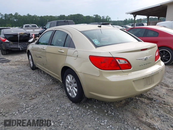 2010 Chrysler Sebring Touring z VIN 1C3CC4FBXAN210425, wystawiony jako IAAI lot #42275197 z przebiegiem 123 200 mil mil oraz . Historia ofert i sprzedaży dostępna na DreamBid. Obrazek 3.