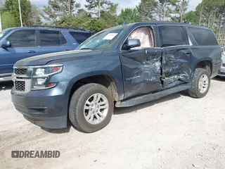 2019 Chevrolet Suburban LT with VIN 1GNSCHKC6KR135270, listed as a IAAI auction lot 41961931 with 103,428 mi miles and . Bid and sale history available at DreamBid. Image 17.