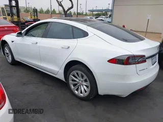 2017 Tesla Model S 60 with VIN 5YJSA1E19HF189578, listed as a IAAI auction lot 42374977 with 40,844 mi miles and . Bid and sale history available at DreamBid. Image 3.