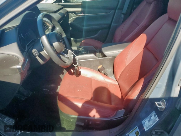 2024 Mazda 3 S Carbon Edition with VIN 3MZBPBCM1RM401627, listed as a Copart auction lot 60840015 with 41,667 mi miles and Clean title. Bid and sale history available at DreamBid. Image 7.