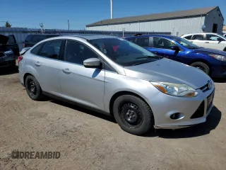 2013 Ford Focus Titanium with VIN 1FADP3J24DL327770, listed as a Copart auction lot 47582605 with 140,710 mi miles and Salvage Title. Bid and sale history available at carsss.com. Image 4.