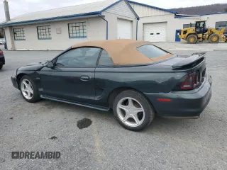 1998 Ford Mustang GT with VIN 1FAFP45XXWF160692, listed as a Copart auction lot 47210885 with 180,035 mi miles and Salvage Title. Bid and sale history available at carsss.com. Image 2.