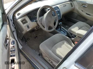 2000 Honda Accord LX z VIN 1HGCG1642YA080255, wystawiony jako Copart lot #53636855 z przebiegiem 146 478 mil mil oraz Szkoda całkowita • Salvage title. Historia ofert i sprzedaży dostępna na DreamBid. Obrazek 8.