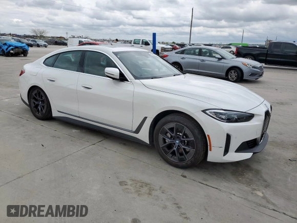 2024 BMW i4 eDrive35 with VIN WBY43AW08RFS83004, listed as a Copart auction lot 50818335 with 12,000 mi miles and Salvage Title. Bid and sale history available at carsss.com. Image 4.