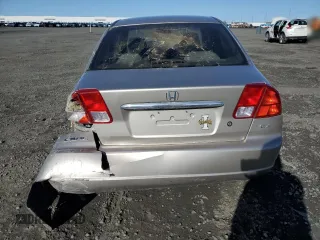 2002 Honda Civic EX with VIN 1HGES25712L014218, listed as a Copart auction lot 52325265 with 206,919 mi miles and Salvage Title. Bid and sale history available at DreamBid. Image 6.