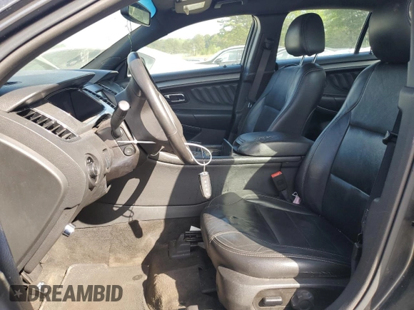 2015 Ford Taurus SEL with VIN 1FAHP2E88FG163929, listed as a Copart auction lot 51893325 with 200,553 mi miles and Clean Title. Bid and sale history available at carsss.com. Image 7.