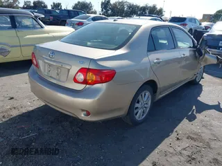 2009 Toyota Corolla with VIN 1NXBU40E29Z085053, listed as a IAAI auction lot 41966832 with 182,941 mi miles. Bid and sale history available at carsss.com. Image 4.