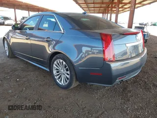 2010 Cadillac CTS with VIN 1G6DK5EG0A0141007, listed as a IAAI auction lot 41841972 with 142,898 mi miles and . Bid and sale history available at DreamBid. Image 3.