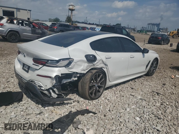 2020 BMW 8 Series M850i z VIN WBAGV8C06LBP48932, wystawiony jako Copart lot #57165015 z przebiegiem 55 731 mil mil oraz Szkoda całkowita • Salvage title. Historia ofert i sprzedaży dostępna na DreamBid. Obrazek 3.
