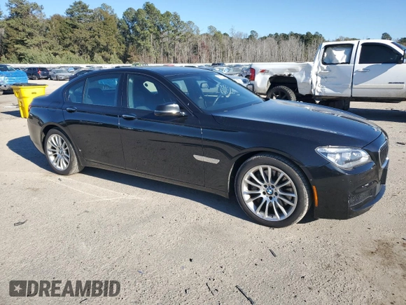 2015 BMW 7 Series 750i xDrive with VIN WBAYB6C57FD965993, listed as a Copart auction lot 83871924 with 76,720 mi miles and Salvage Title. Bid and sale history available at carsss.com. Image 4.