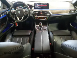 2019 BMW 5 Series 530e xDrive with VIN WBAJB1C56KB376153, listed as a Copart auction lot 58242585 with 67,638 mi miles and Salvage title. Bid and sale history available at DreamBid. Image 8.
