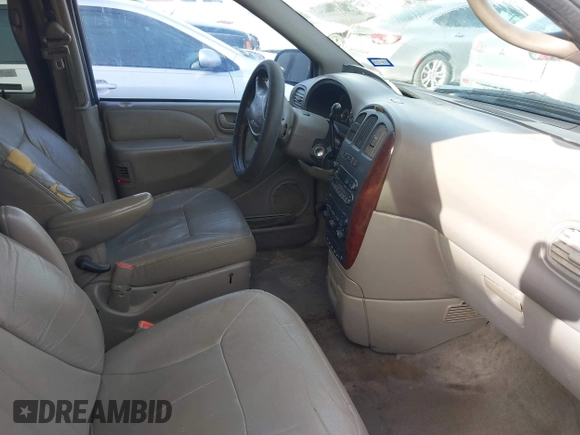 2001 Chrysler Town & Country with VIN 2C4GP54371R356559, listed as a IAAI auction lot 41731368 with 195,903 mi miles and . Bid and sale history available at DreamBid. Image 5.