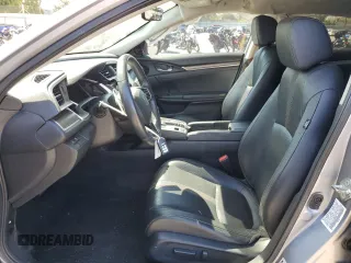 2020 Honda Civic EX-L z VIN 19XFC1F70LE209746, wystawiony jako Copart lot #52141315 z przebiegiem 84 387 mil mil oraz Szkoda całkowita • Salvage title. Historia ofert i sprzedaży dostępna na DreamBid. Obrazek 7.