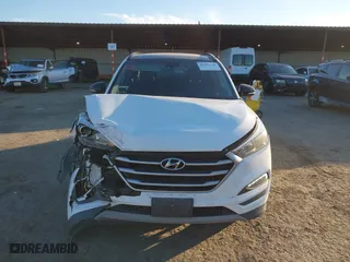 2017 Hyundai Tucson Value with VIN KM8J33A27HU541527, listed as a IAAI auction lot 41382244 with 65,848 mi miles. Bid and sale history available at carsss.com. Image 12.