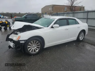2014 Chrysler 300 with VIN 2C3CCAAG3EH182984, listed as a Copart auction lot 51958655 with 207,595 mi miles and Salvage Title. Bid and sale history available at DreamBid. Image 1.