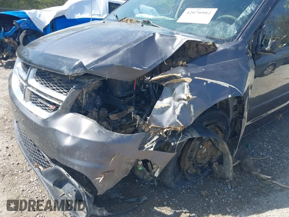 2017 Dodge Grand Caravan SE z VIN 2C4RDGBG1HR725915, wystawiony jako IAAI lot #42070982 z przebiegiem 134 659 mil mil oraz . Historia ofert i sprzedaży dostępna na DreamBid. Obrazek 6.
