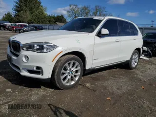 2018 BMW X5 xDrive35i with VIN 5UXKR0C53J0X93705, listed as a Copart auction lot 51715435 with 106,677 mi miles and Salvage Title. Bid and sale history available at carsss.com. Image 1.
