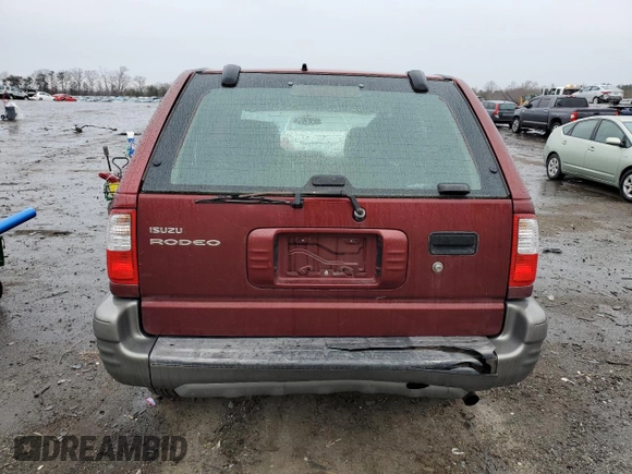 2002 Isuzu Rodeo z VIN 4S2CK58D124323937, wystawiony jako Copart lot #86155194 z przebiegiem 184 491 mil mil oraz Szkoda całkowita • Salvage title. Historia ofert i sprzedaży dostępna na DreamBid. Obrazek 6.