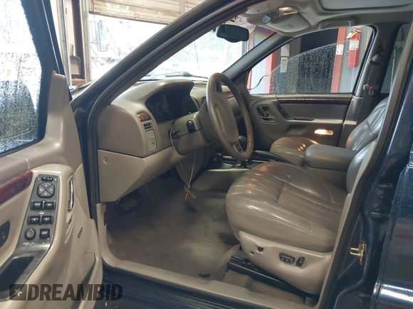 2000 Jeep Grand Cherokee Limited with VIN 1J4GW58N1YC264567, listed as a IAAI auction lot 42215459 with 170,874 mi miles and . Bid and sale history available at DreamBid. Image 5.