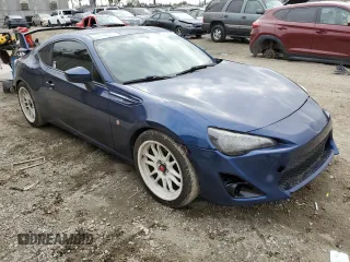 2017 Toyota 86 with VIN JF1ZNAA17H8700476, listed as a Copart auction lot 43182715 with 107,400 mi miles and Salvage Title. Bid and sale history available at carsss.com. Image 4.