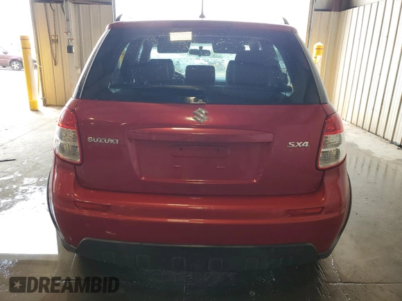 2013 Suzuki SX4 Crossover z VIN JS2YB5A38D6100035, wystawiony jako Copart lot #59970015 z przebiegiem 119 995 mil mil oraz Szkoda całkowita • Salvage title. Historia ofert i sprzedaży dostępna na DreamBid. Obrazek 6.