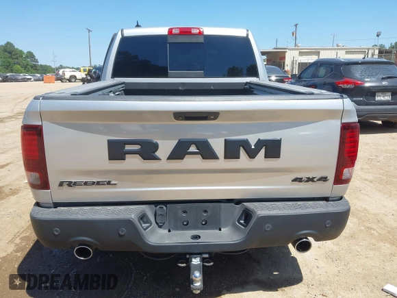 2016 Ram 1500 Rebel z VIN 1C6RR7YT7GS185173, wystawiony jako IAAI lot #42033684 z przebiegiem 152 758 mil mil oraz . Historia ofert i sprzedaży dostępna na DreamBid. Obrazek 16.