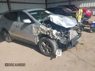 2018 Hyundai Santa Fe 2.4L z VIN 5XYZTDLBXJG558694, wystawiony jako IAAI lot #42099702 z przebiegiem 130 025 mil mil oraz . Historia ofert i sprzedaży dostępna na DreamBid. Obrazek 1.