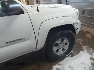 2013 Toyota Tacoma with VIN 3TMLU4EN2DM104490, listed as a IAAI auction lot 41636616 with 153,036 mi miles and . Bid and sale history available at DreamBid. Image 6.