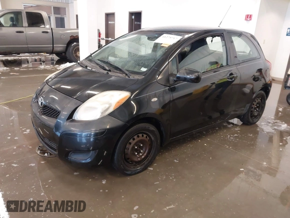 2011 Toyota Yaris with VIN JTDJT4K3XB5327229, listed as a IAAI auction lot 41275717 with 140,276 mi miles. Bid and sale history available at carsss.com. Image 18.