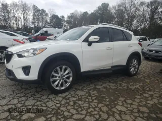 2015 Mazda CX-5 Grand Touring with VIN JM3KE2DY6F0504784, listed as a Copart auction lot 47671705 with 174,682 mi miles and Salvage Title. Bid and sale history available at carsss.com. Image 1.