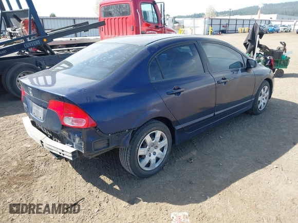 2007 Honda Civic Sdn LX with VIN 1HGFA16587L124463, listed as a IAAI auction lot 42042736 with 189,929 mi miles. Bid and sale history available at carsss.com. Image 4.