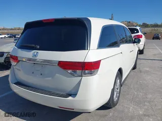 2016 Honda Odyssey EX-L with VIN 5FNRL5H65GB055916, listed as a IAAI auction lot 41980339 with 87,497 mi miles. Bid and sale history available at carsss.com. Image 4.