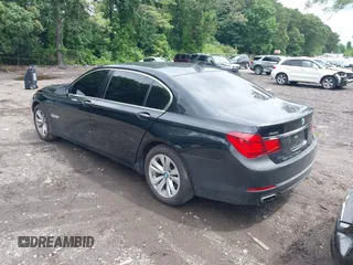 2015 BMW 7 Series 740Li xDrive with VIN WBAYF4C55FG291723, listed as a IAAI auction lot 42694382 with 101,140 mi miles and . Bid and sale history available at DreamBid. Image 3.