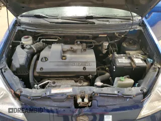 2005 Suzuki Aerio SX z VIN JS2RC61H455303174, wystawiony jako Copart lot #87417584 z przebiegiem 263 530 mil mil oraz Szkoda całkowita • Salvage title. Historia ofert i sprzedaży dostępna na DreamBid. Obrazek 11.