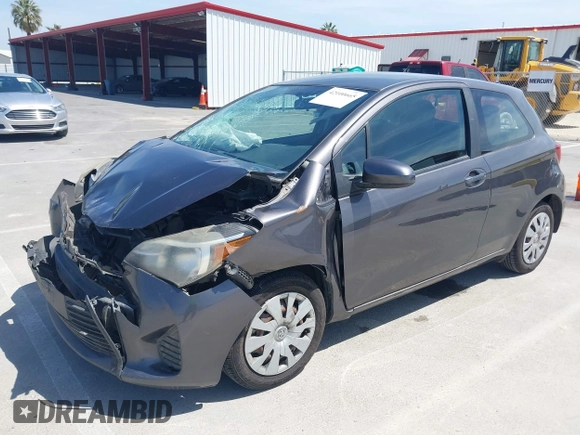 2015 Toyota Yaris L with VIN VNKJTUD33FA053390, listed as a IAAI auction lot 42100665 with 207,939 mi miles and . Bid and sale history available at carsss.com. Image 2.
