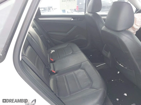 2014 Volkswagen Passat Wolfsburg Ed with VIN 1VWAT7A33EC091975, listed as a IAAI auction lot 41489344 with 97,306 mi miles. Bid and sale history available at carsss.com. Image 8.