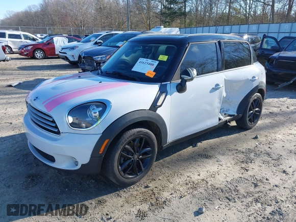 2012 MINI Countryman with VIN WMWZB3C50CWM30524, listed as a IAAI auction lot 41623400 with 194,858 mi miles and . Bid and sale history available at DreamBid. Image 17.