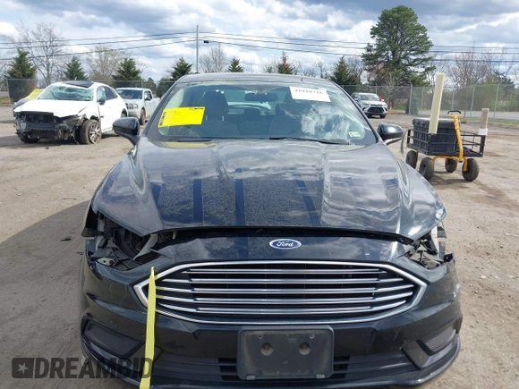 2017 Ford Fusion S with VIN 3FA6P0G77HR212596, listed as a IAAI auction lot 41910716 with 94,502 mi miles. Bid and sale history available at carsss.com. Image 12.