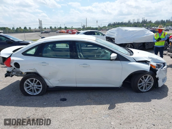 2018 Ford Focus SE with VIN 1FADP3F29JL213008, listed as a IAAI auction lot 41790224 with 85,056 mi miles and . Bid and sale history available at DreamBid. Image 14.