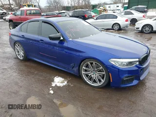 2018 BMW 5 Series 540i xDrive with VIN WBAJE7C5XJWC56733, listed as a IAAI auction lot 41558451 with 67,460 mi miles and . Bid and sale history available at DreamBid. Image 1.