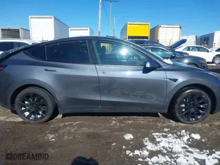 2023 Tesla Model Y Long Range with VIN 7SAYGAEE9PF905943, listed as a IAAI auction lot 41444255 with 11,179 mi miles. Bid and sale history available at carsss.com. Image 12.