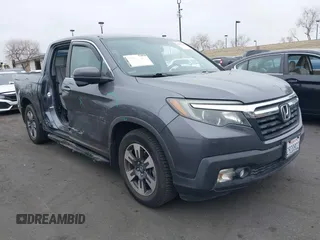 2017 Honda Ridgeline RTL-T with VIN 5FPYK2F67HB002854, listed as a IAAI auction lot 41895895 with 86,882 mi miles and . Bid and sale history available at DreamBid. Image 1.